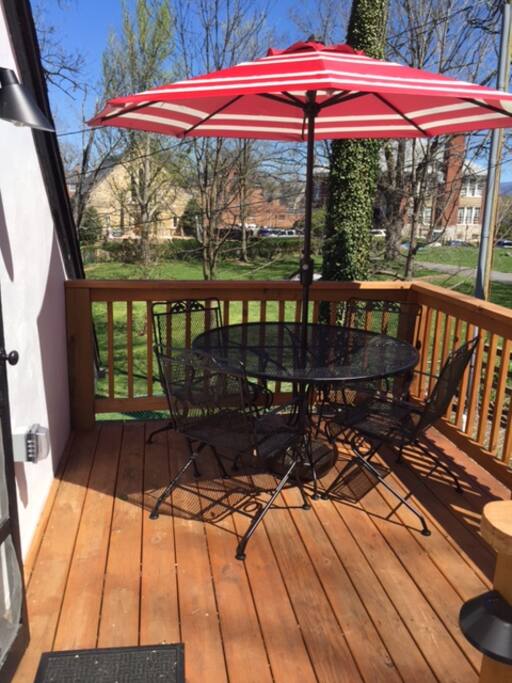 Deck with table and umbrella