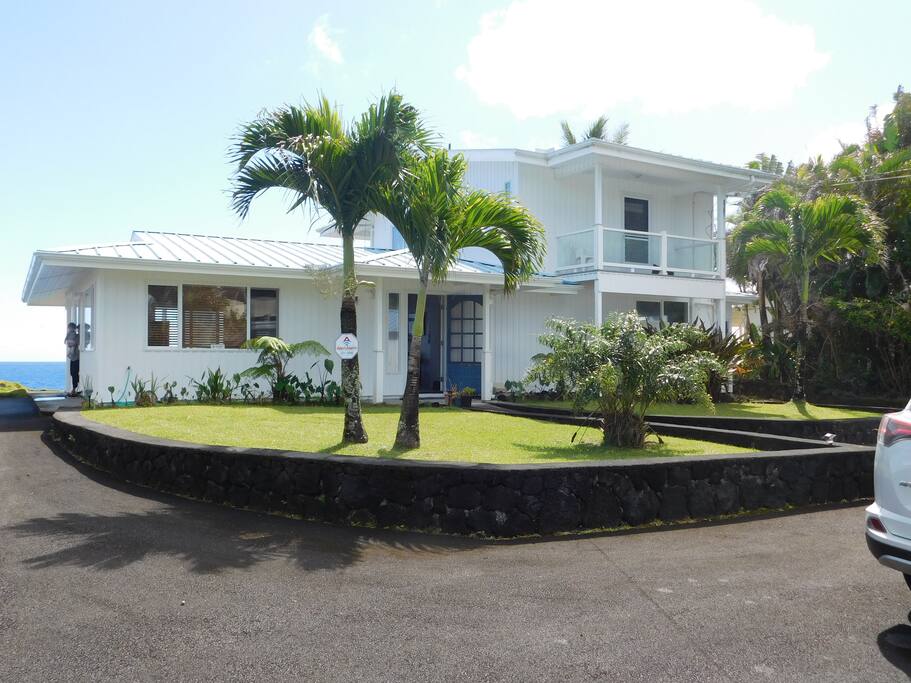The home in full view, with the ocean nearly at your feet.