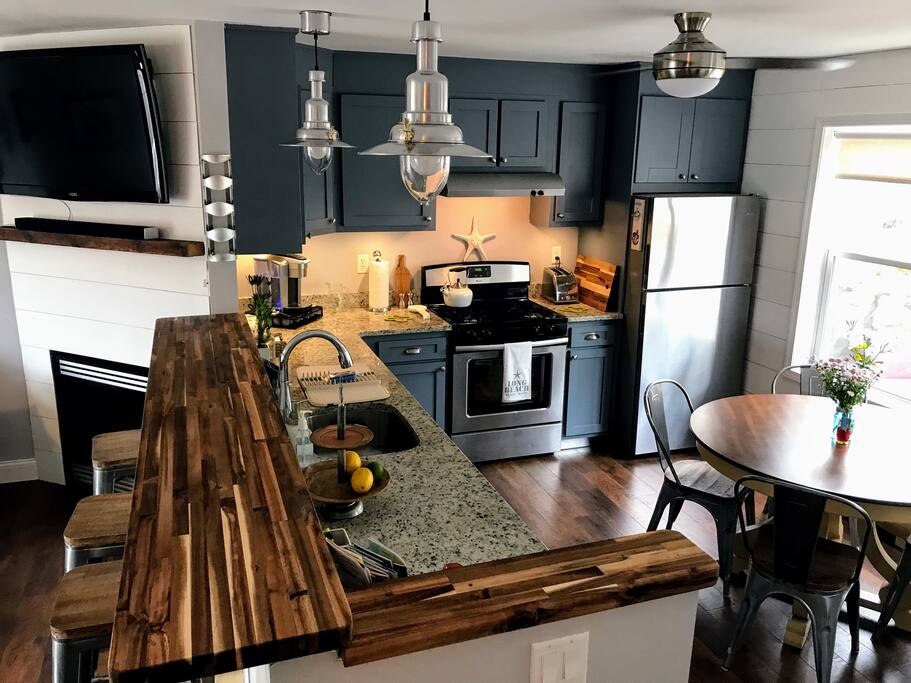 Fully stocked modern kitchen, with all the amenities.