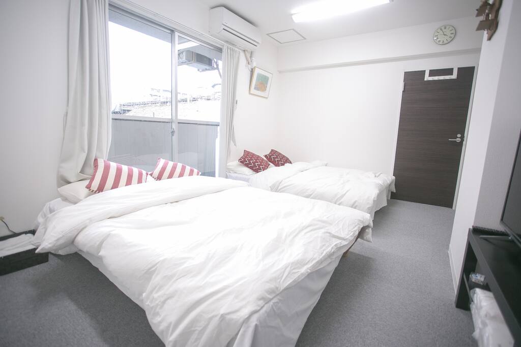 bedroom 1 with 2 double sized beds