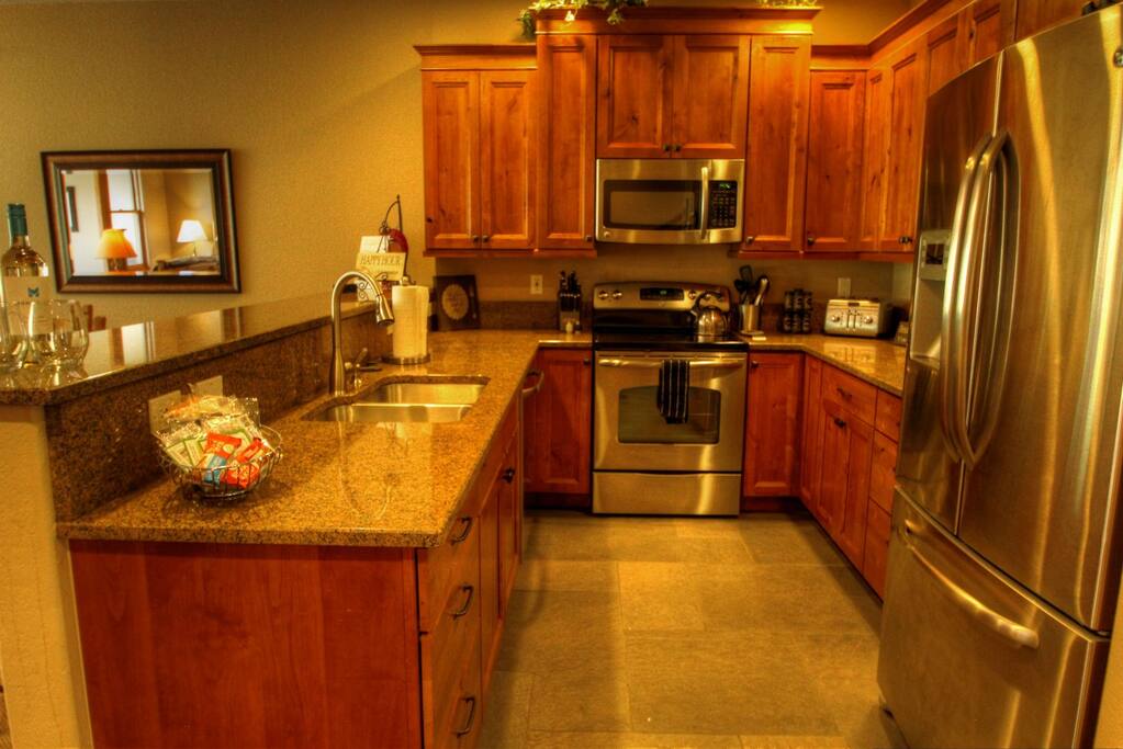 Kitchen - The kitchen features new stainless steel appliances, granite counters, and alder cabinets.