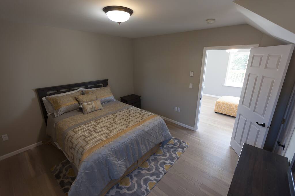 Bedroom 2. Significantly less light than the other bedroom, but still spacious. Nice having the 2 bedrooms on opposite ends of the apartment. Added privacy