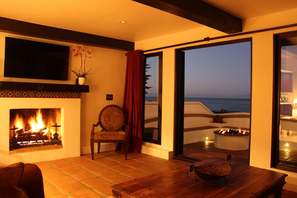 Living Room to Courtyard with Firepit at Dusk