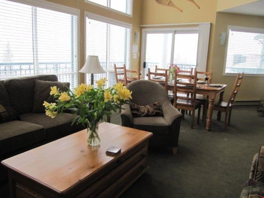 Large windows allow plenty of light into the large living room.