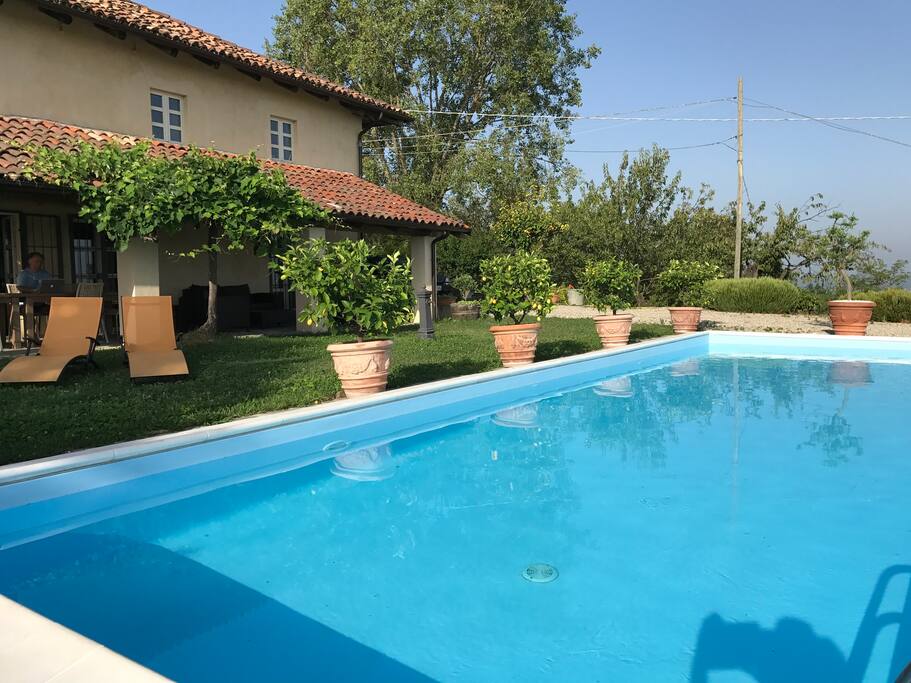View of house and veranda from poolside
