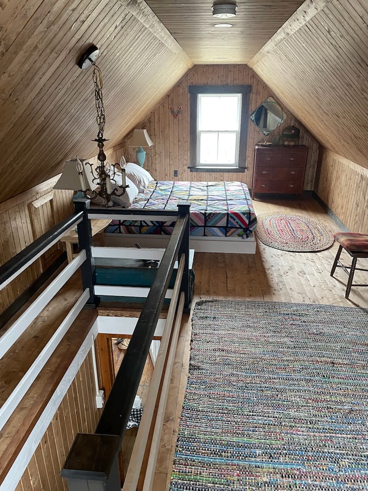 Newly renovated loft master bedroom with its own staircase.
