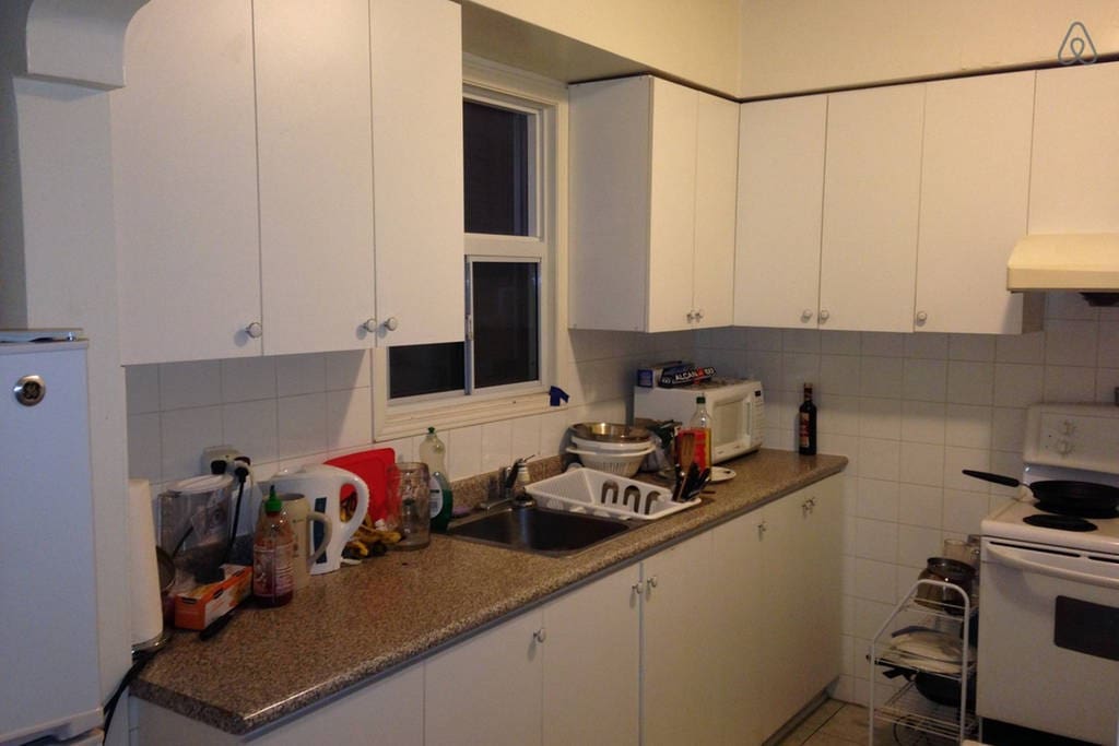 Kitchen includes a microwave, plenty of fridge/freezer/cabinet space, as well as an electric kettle.