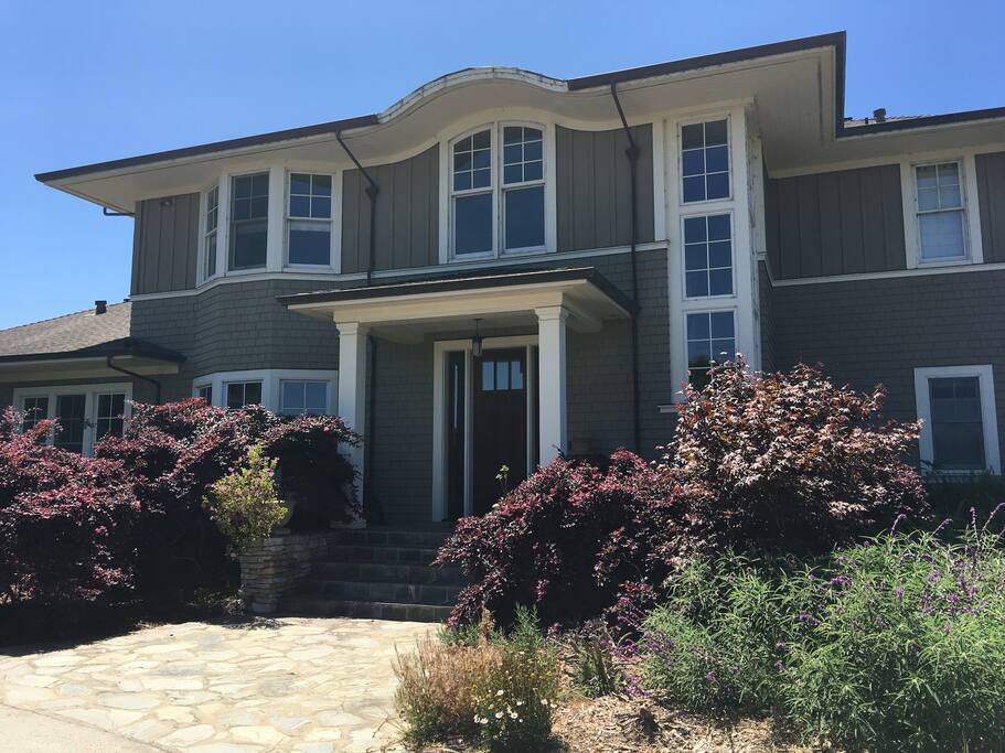 Front door facing large circular driveway
