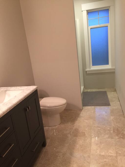 walk in shower, heated, marble-tiled flooring