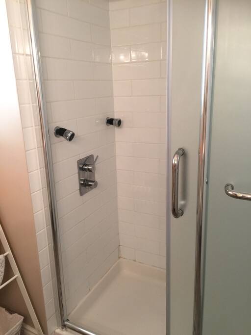 bathroom shower with sliding door
