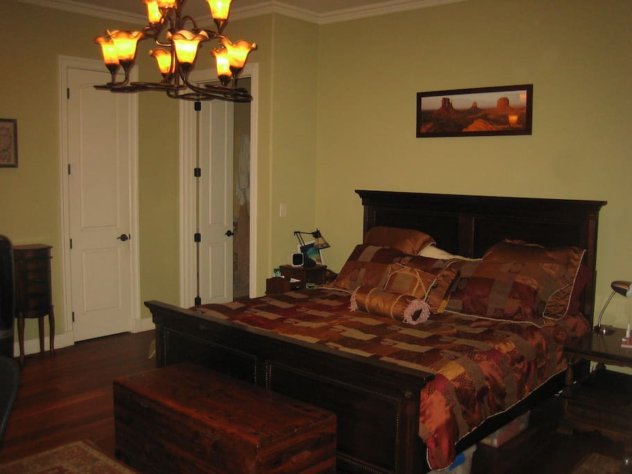 Downstairs Master bed with French doors to deck