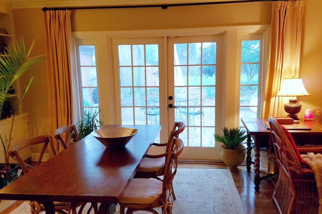 Dining room with French doors to patio. Table seats six.