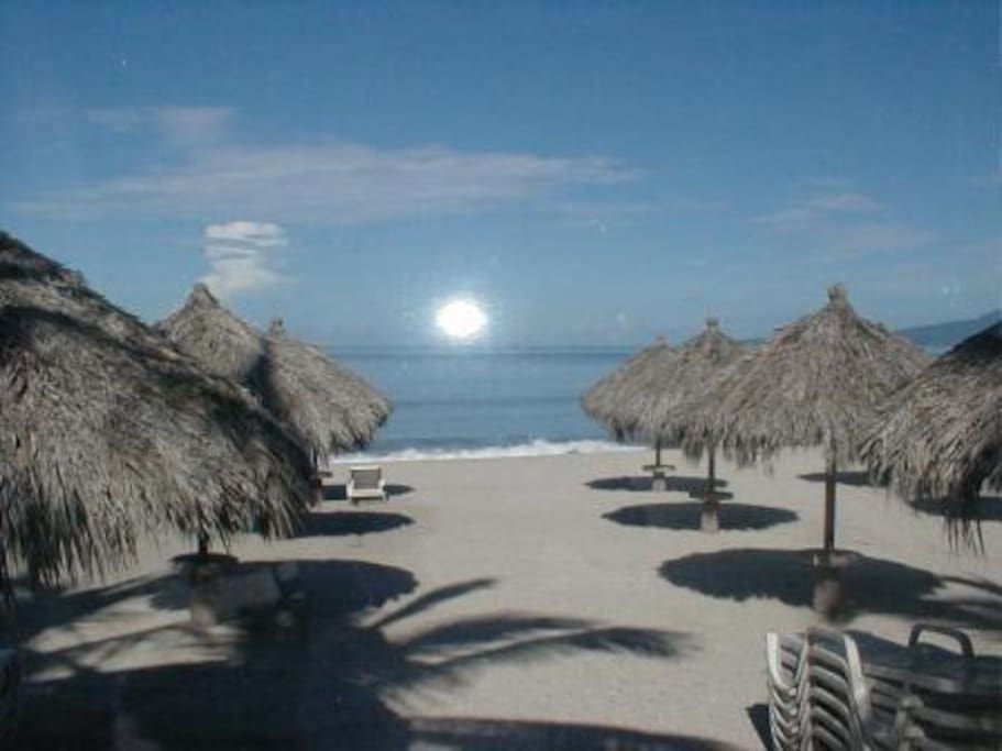 Beach club with palapas @ Playa Royal