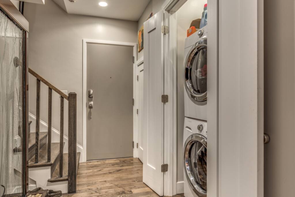 The only thing between the room and the entry door, conveniently is the laundry.