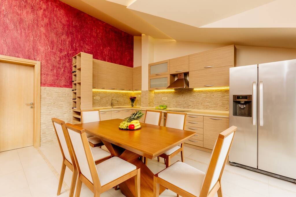 Dining area with kitchen(dishwasher and dining table)From the kitchen amazing view on the town