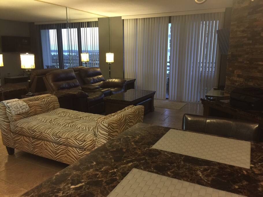 Living area with stone accent wall.