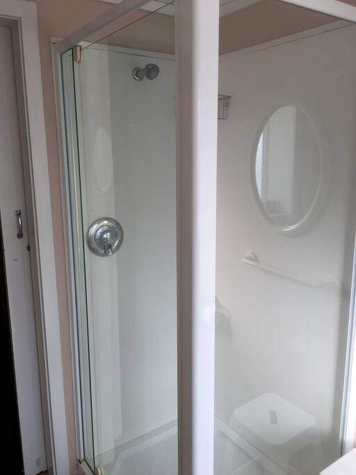 Bathroom with all facilities showing shower
