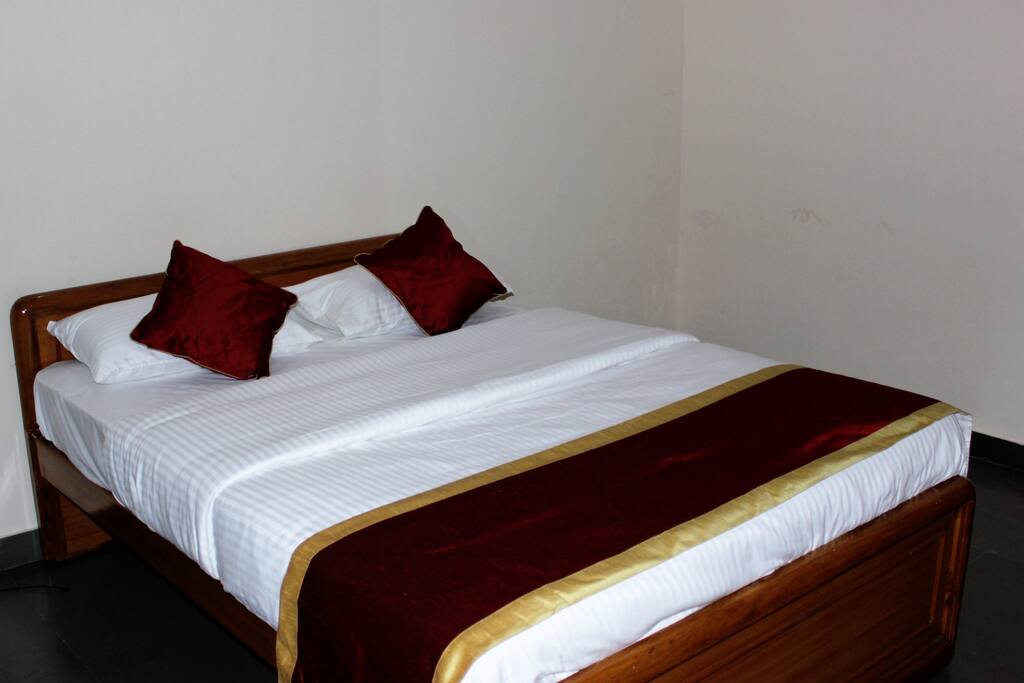 First Bed Room with a Queen Size Bed and a separate bath room