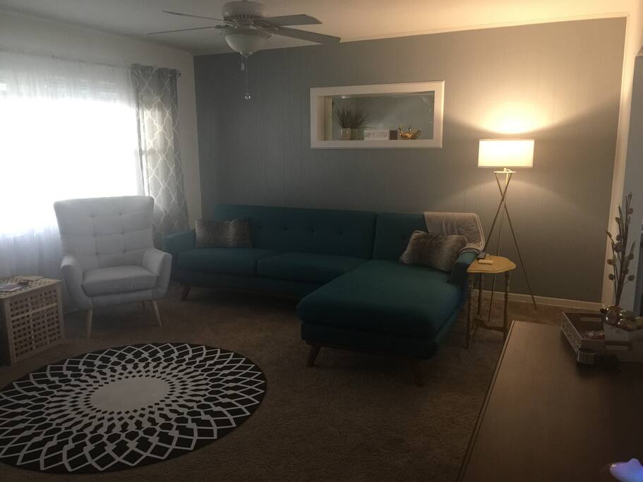 Living room with modern furniture and natural lighting