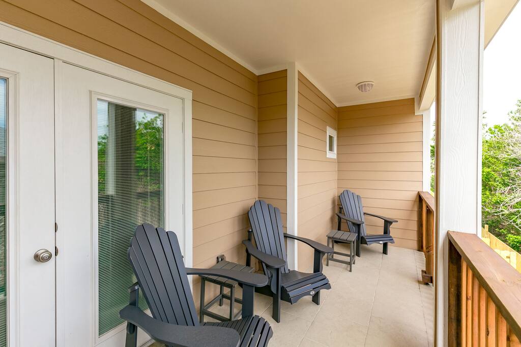 Outdoor seating on the breezy balcony