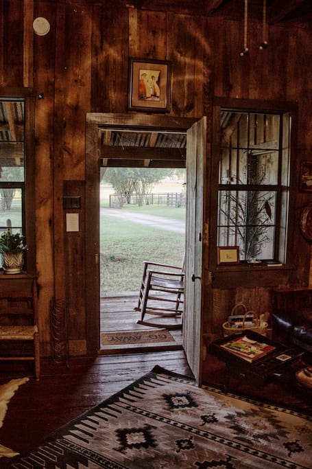 Front Door of the cabin looking out on the porch