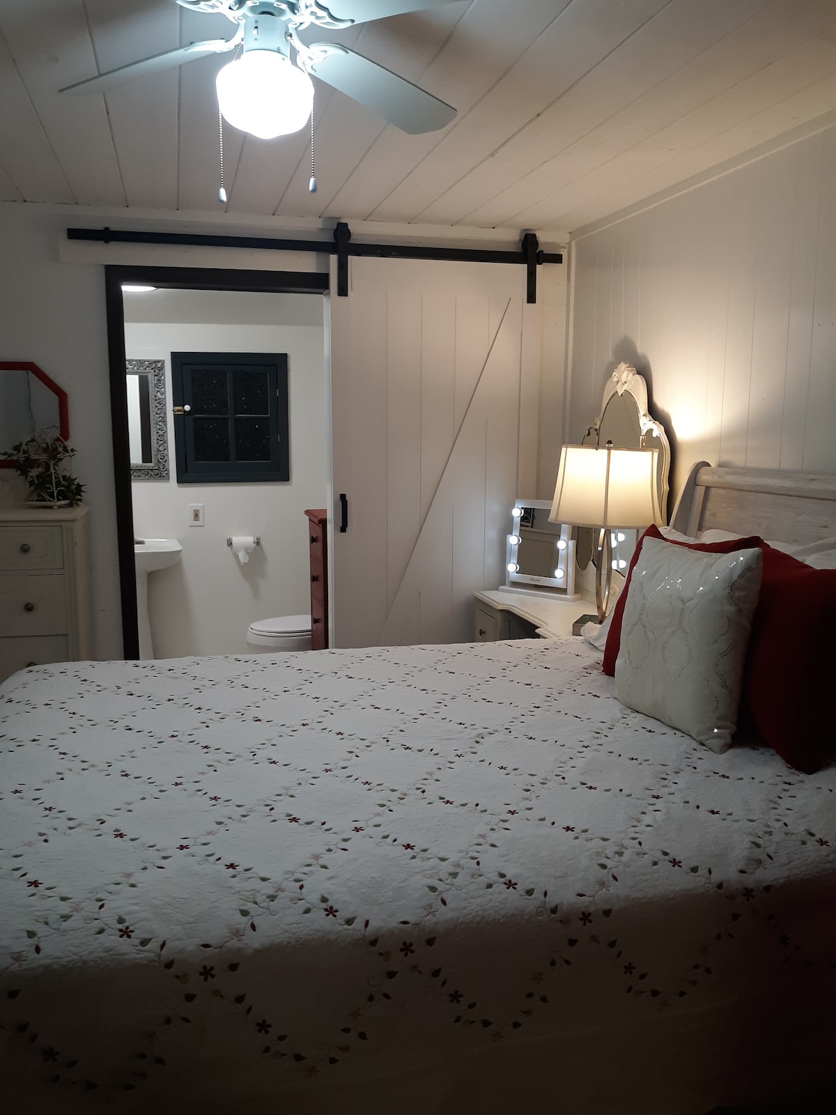 Barn door entrances to bedroom and upgraded bath