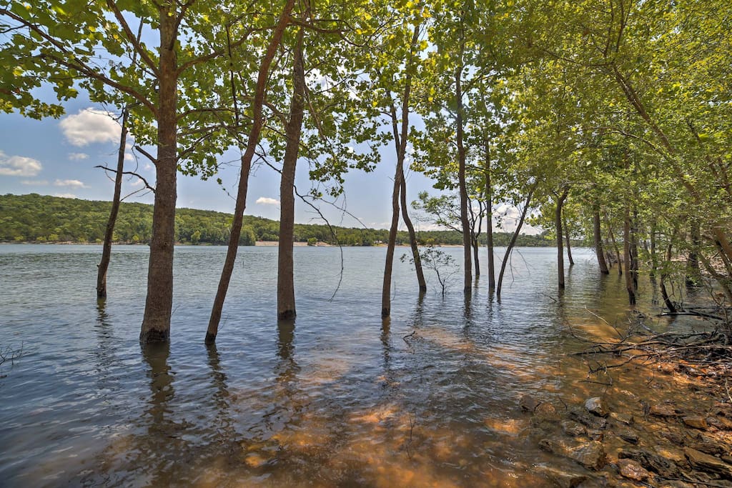 The home boasts a prime lakefront location on 3 acres of wooded property.