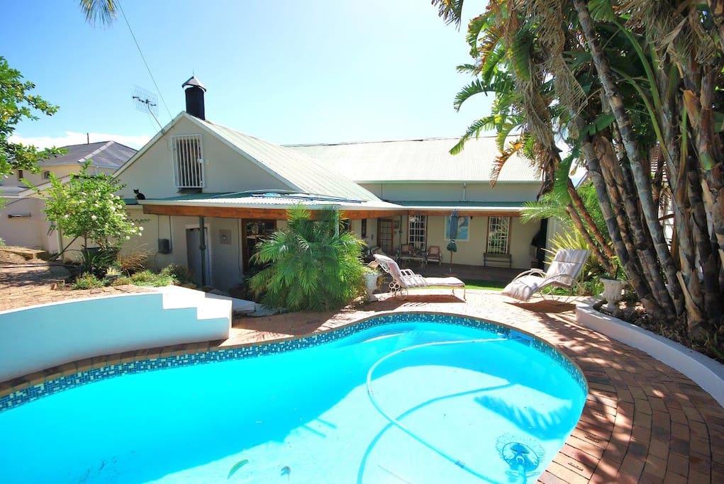 Access to the back garden with pool