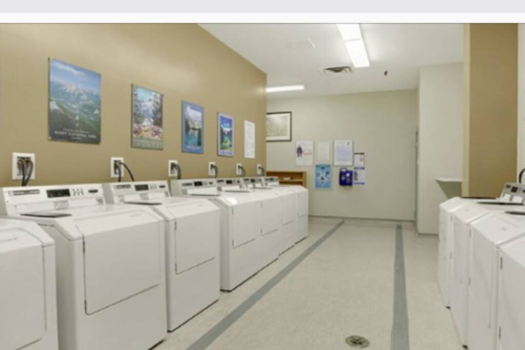 Laundry room in building on the first floor.