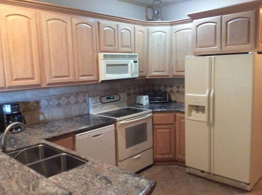 Kitchen with utensils, toaste
