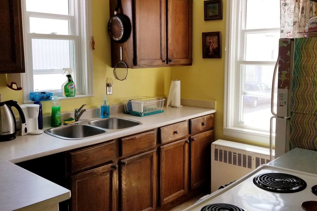 Kitchen, shared large fridge. Ample cooking gear.