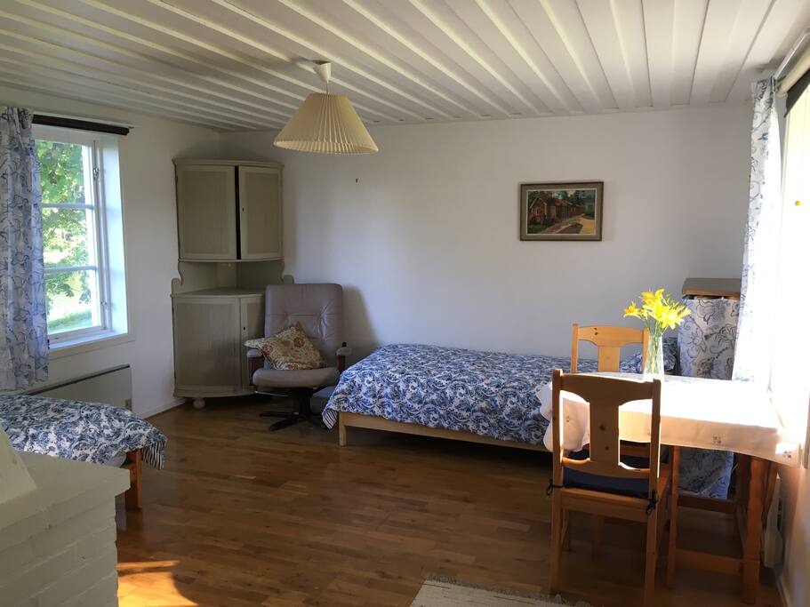 Cute and clean room with fresh air coming in. 2 single beds and 1 foldable bed. Max 3 people can sleep. Dining Table with 3 chairs.