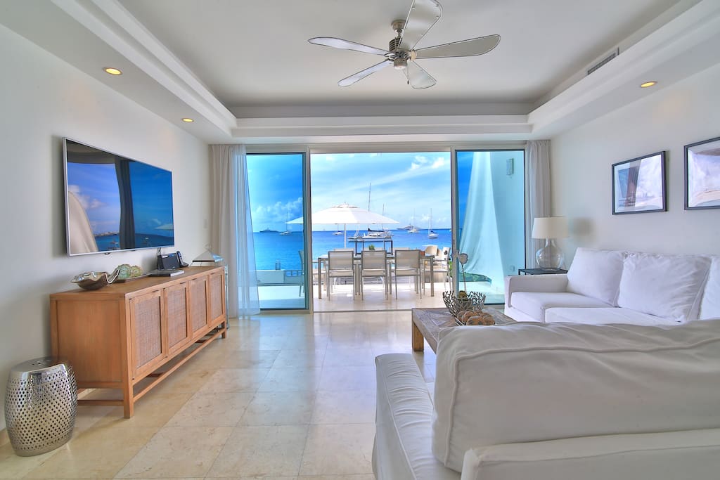 Living room opening to beach side terrace & deck