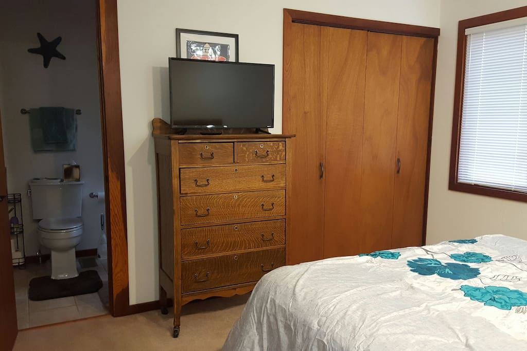 View of the rest of the room as well as the bathroom