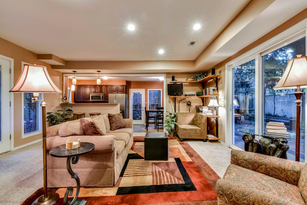 Cozy Living room with great view of huge Oak Trees on the back deck.
