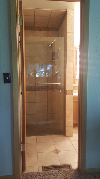 Walk in shower. Ensuite to main bedroom.