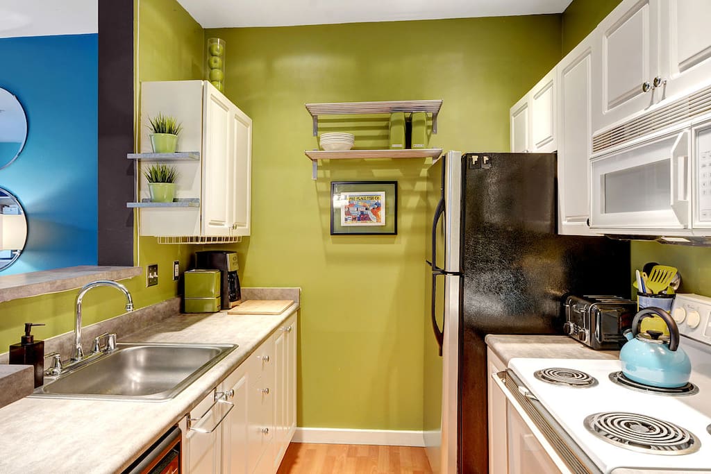Fully stocked kitchen awaits your chef's touch!