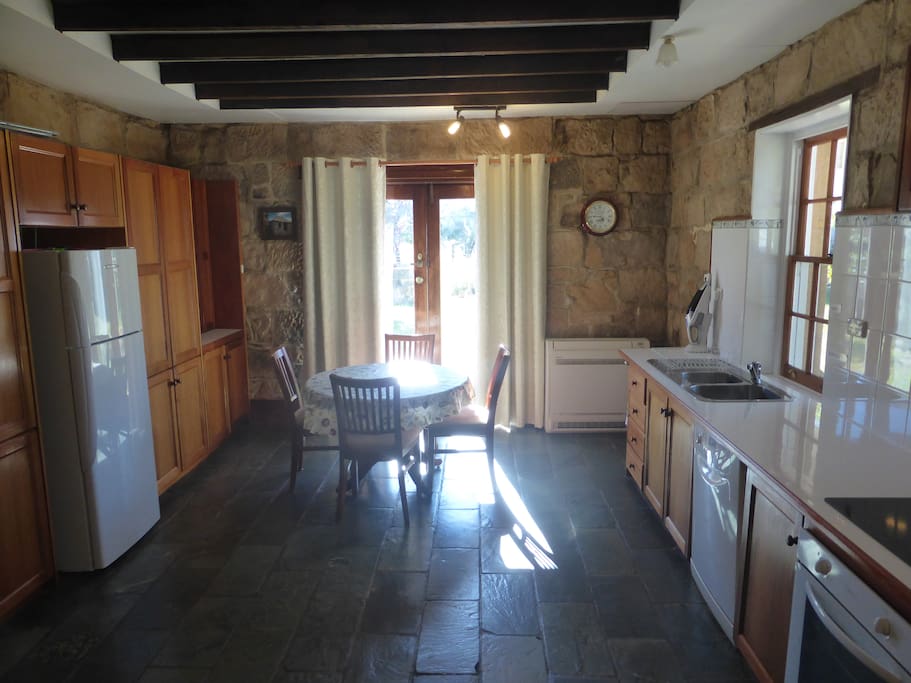 Kitchen - with casual dining setting.
