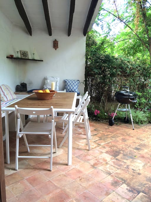 Partly covered patio terrace with BBQ and views of Deia puig.