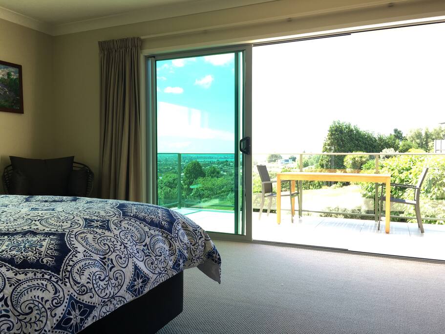 Studio opens out to balcony with water views