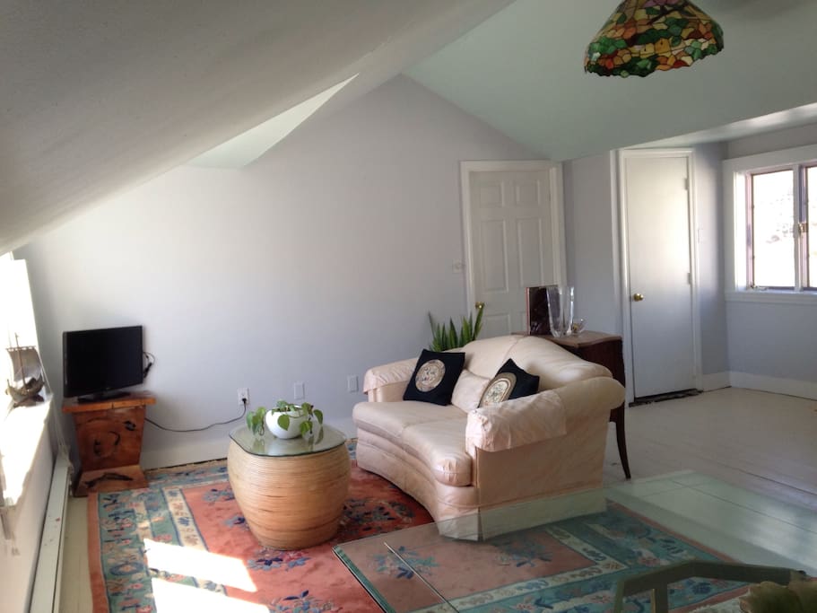 Living Room comes equipped with television & radio