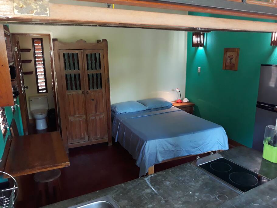 Private bath, clothes closet, deluxe double bed, mid-size fridge
