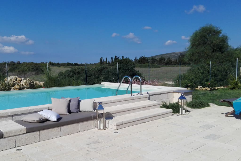 Pool with pool side seatting