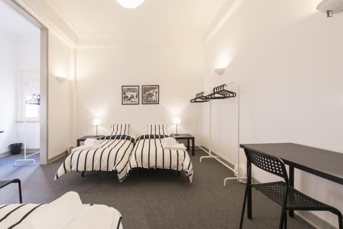 Beautiful room with large window with blinds