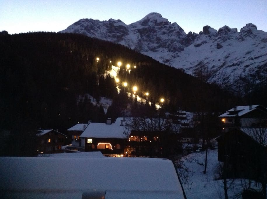 view of night skiing from balcony
