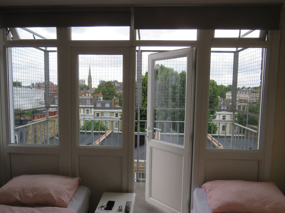 The Rear Windows, and the Balcony in the Studio Flat