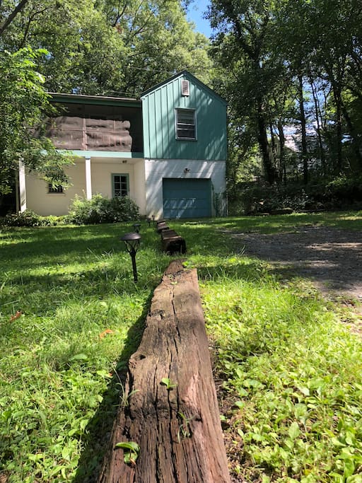 Driveway leading to house.
