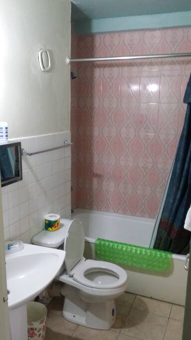 Restroom with slip resistant rubber and toiletries including towels and rags