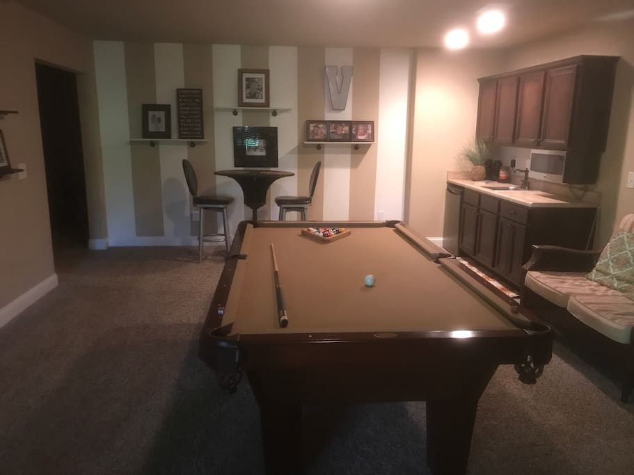 Pool table and pub table and chairs