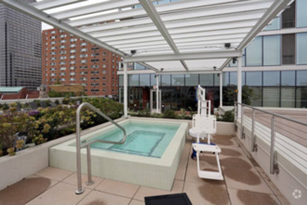 Hot tub on building patio